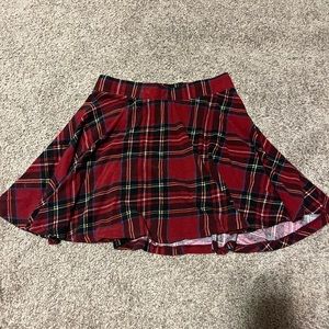 red plaid skirt. size-xs. brand-ginger g